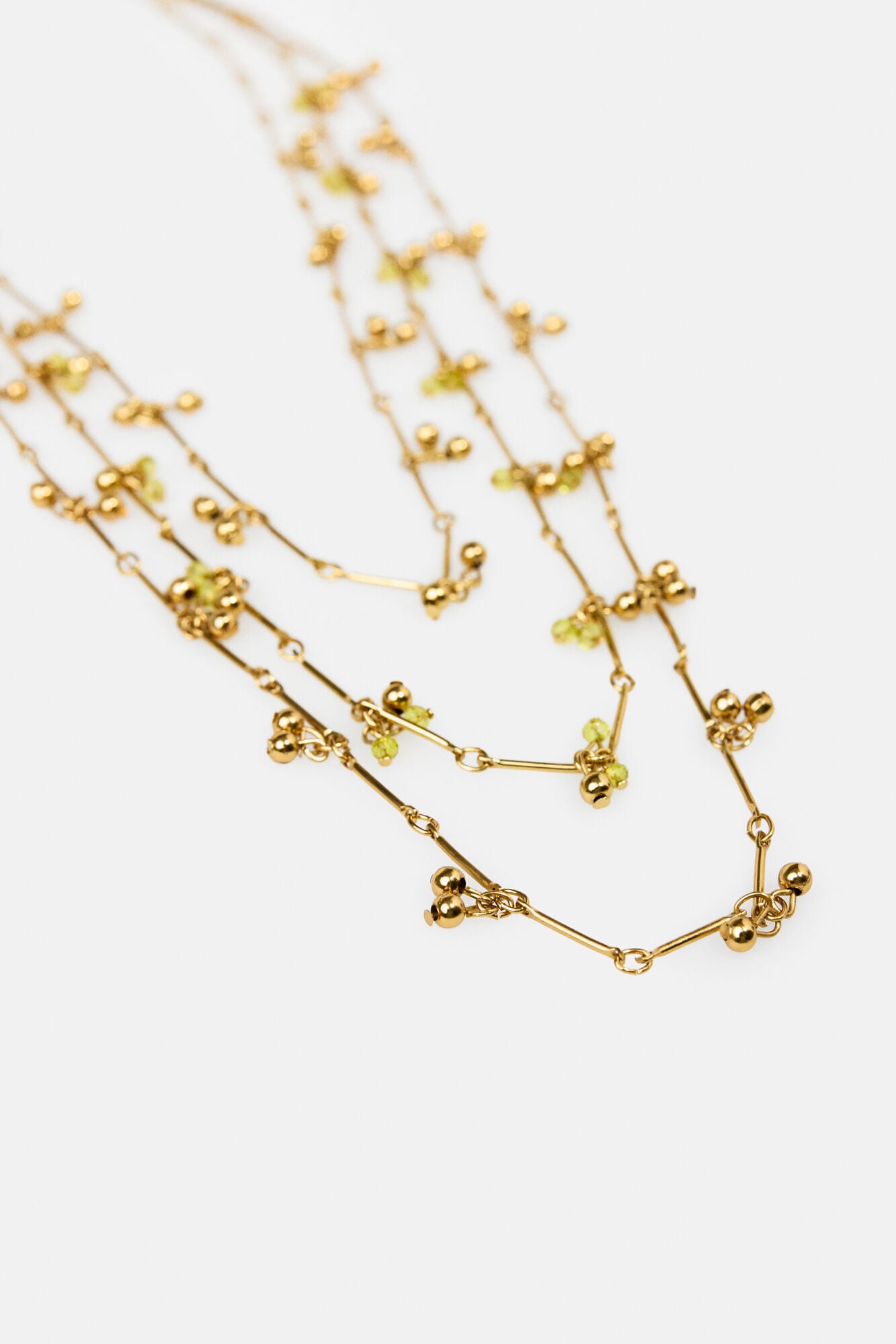 Hoss Intropia Leonor. Collar multitiras ba&ntilde;ado en oro